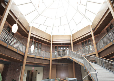 Building interior with glass ceilings and staircase