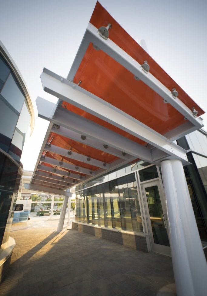 Building with orange painted glass awning